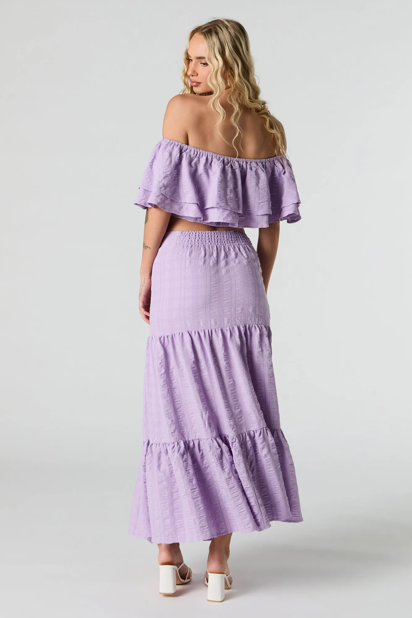 Jupe maxi texturée avec fente et étagée