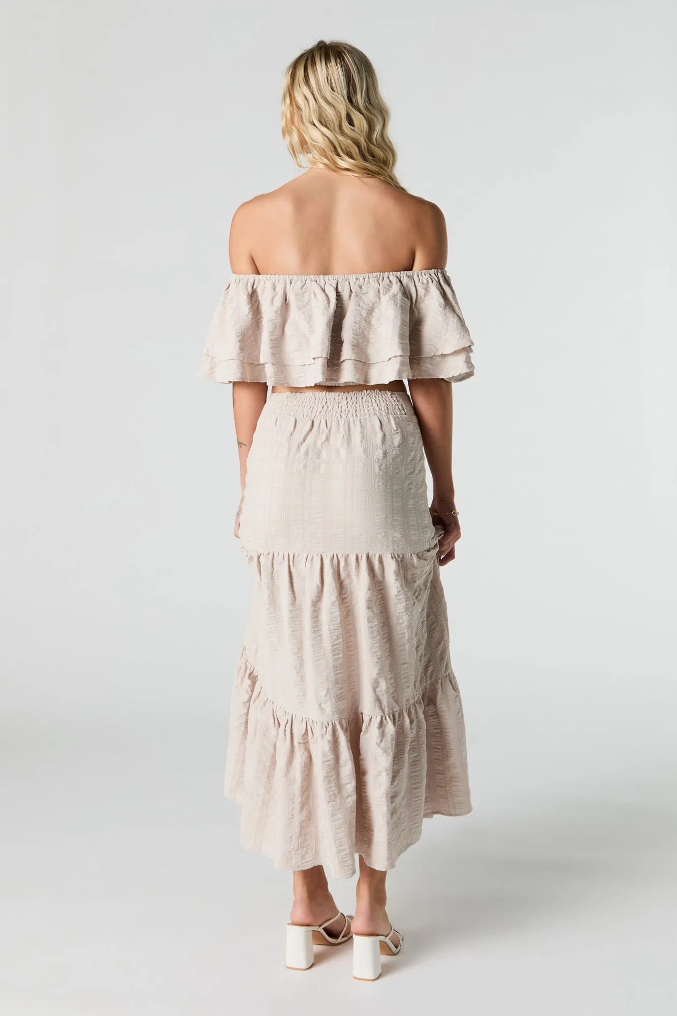 Jupe maxi texturée avec fente et étagée