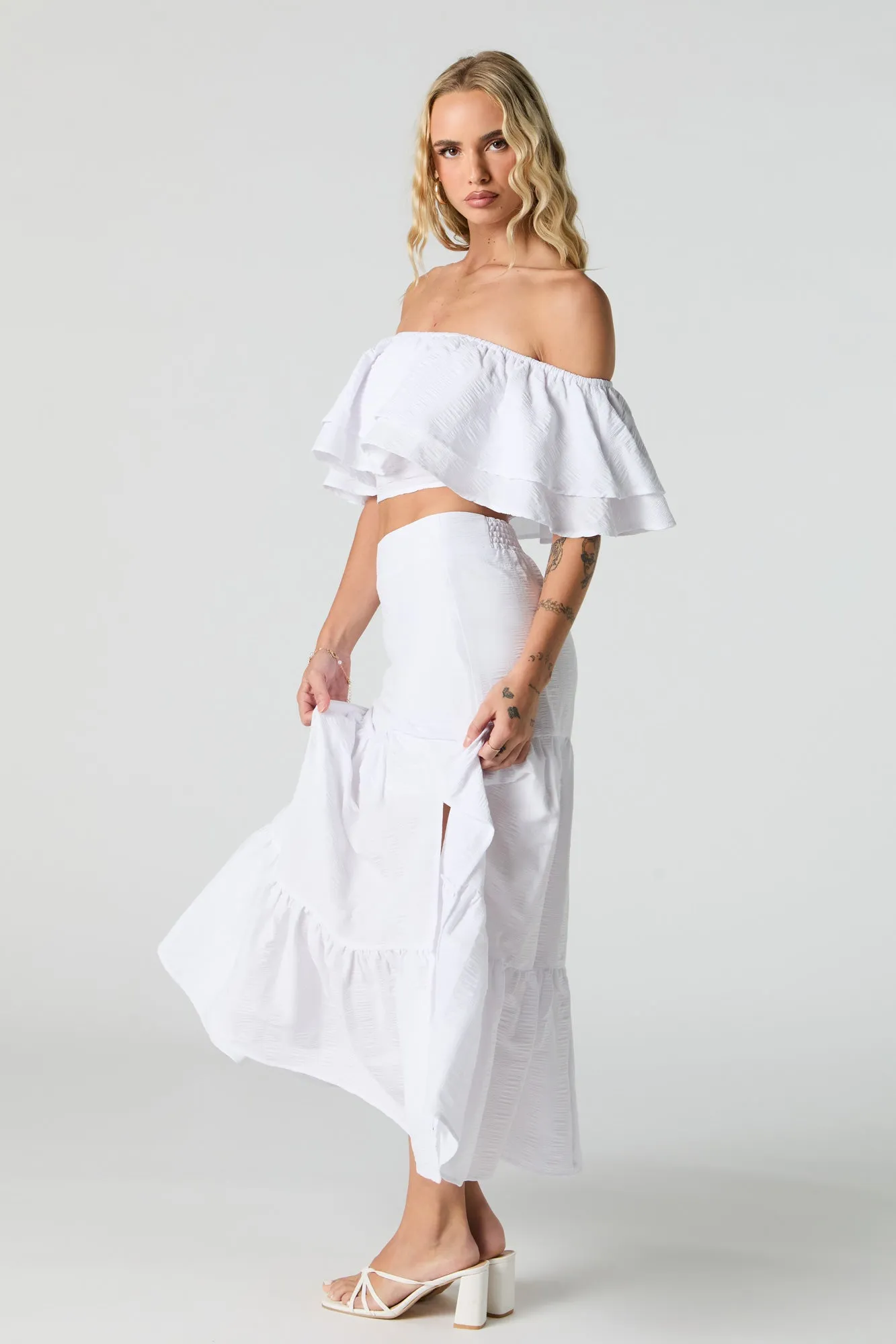 Jupe maxi texturée avec fente et étagée