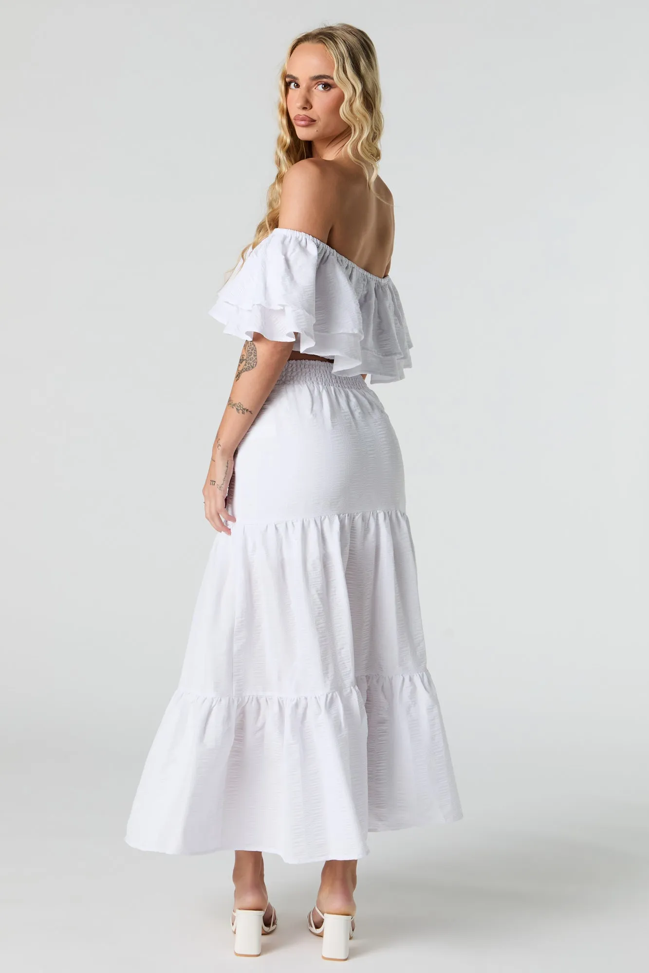 Jupe maxi texturée avec fente et étagée