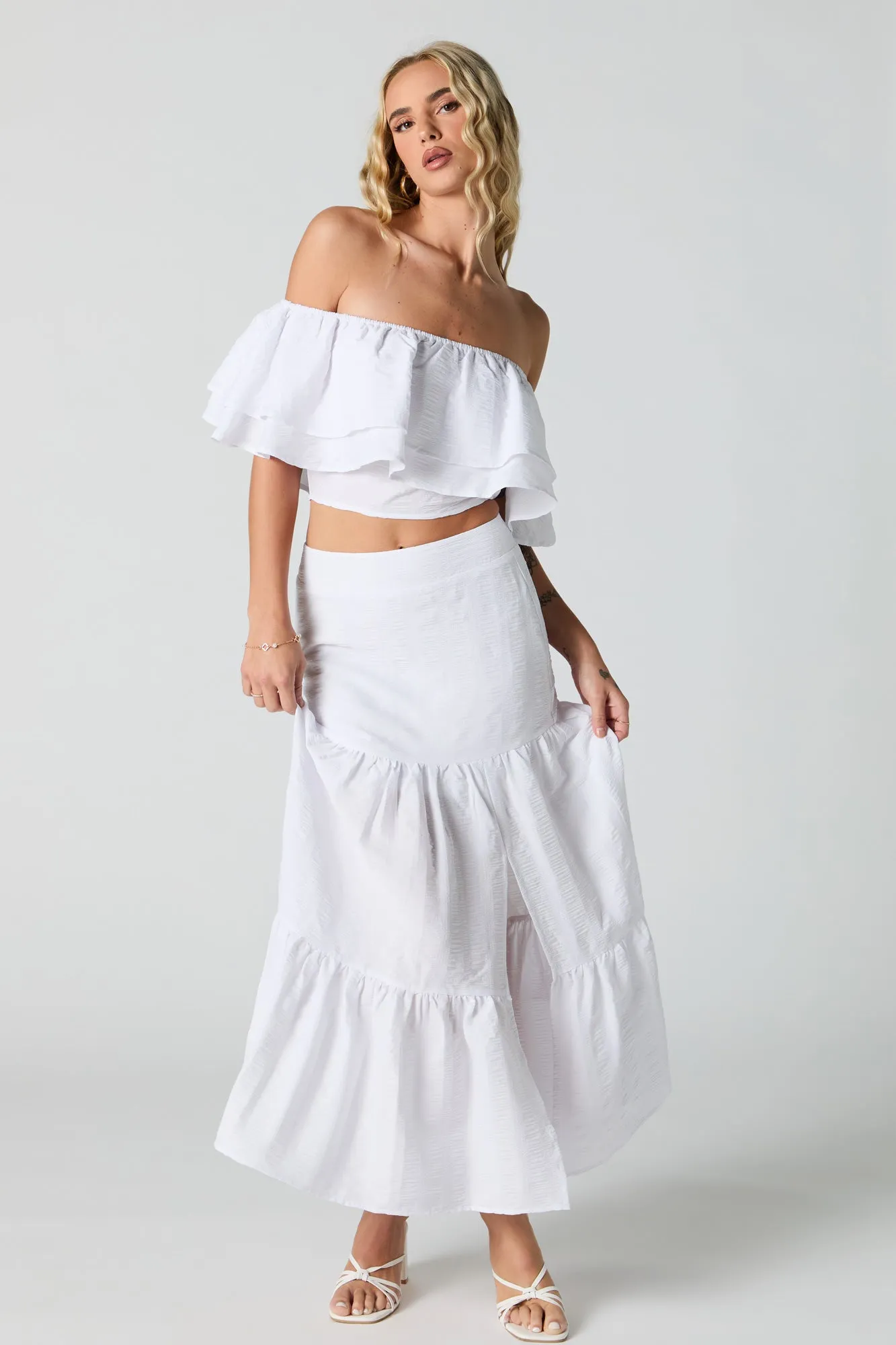 Jupe maxi texturée avec fente et étagée