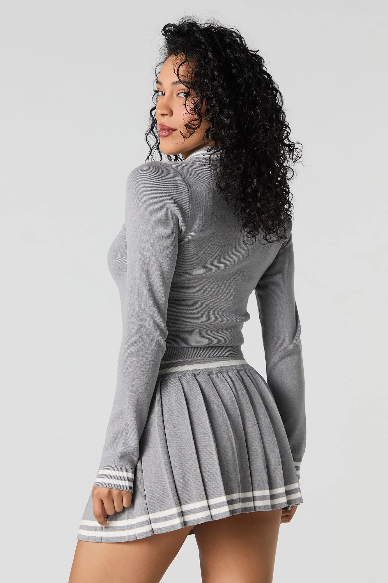 Minijupe plissée en tricot contrastant