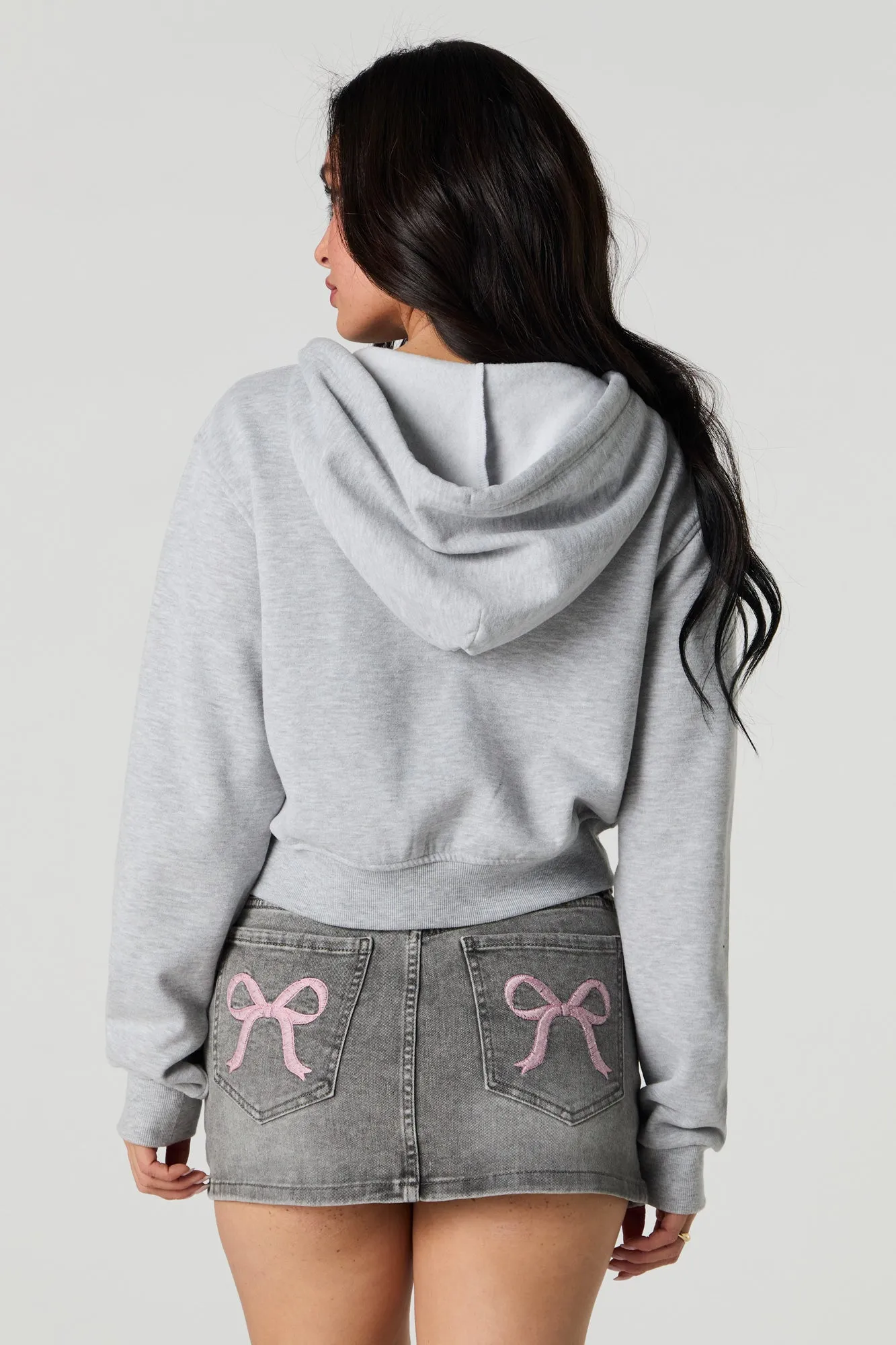 Minijupe-short en denim avec poches arrière brodées