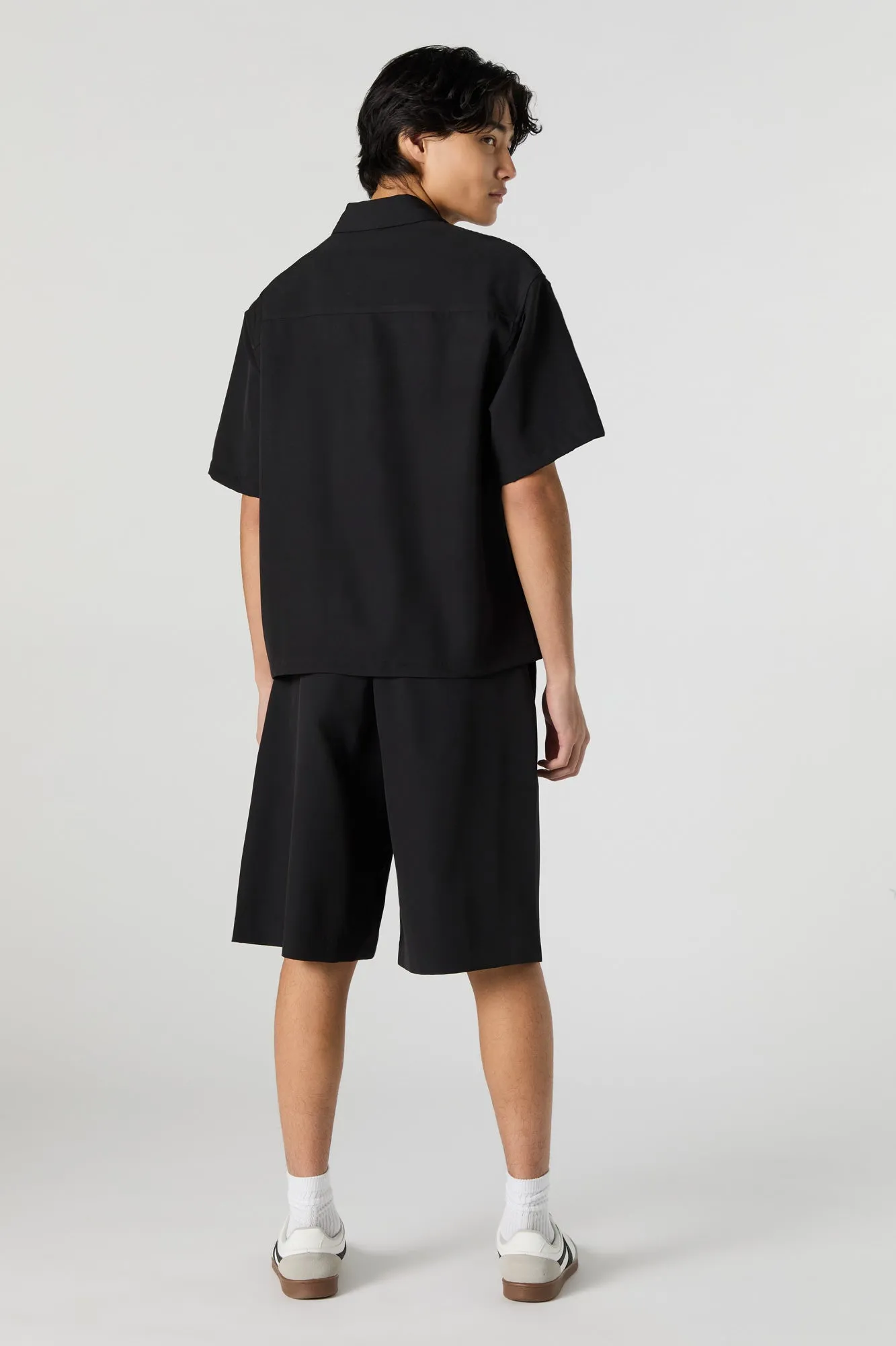 Short ajusté plissé