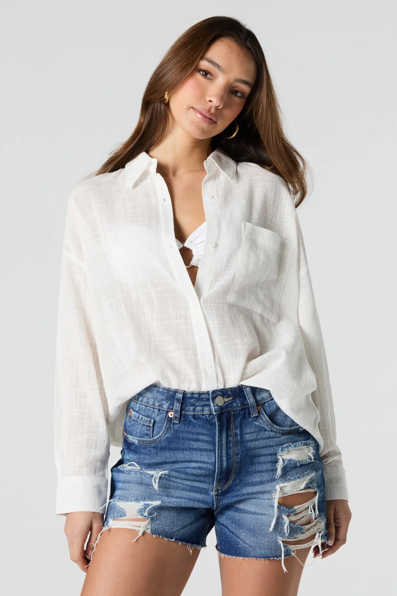 Short de coupe garçonne en denim d'aspect usé