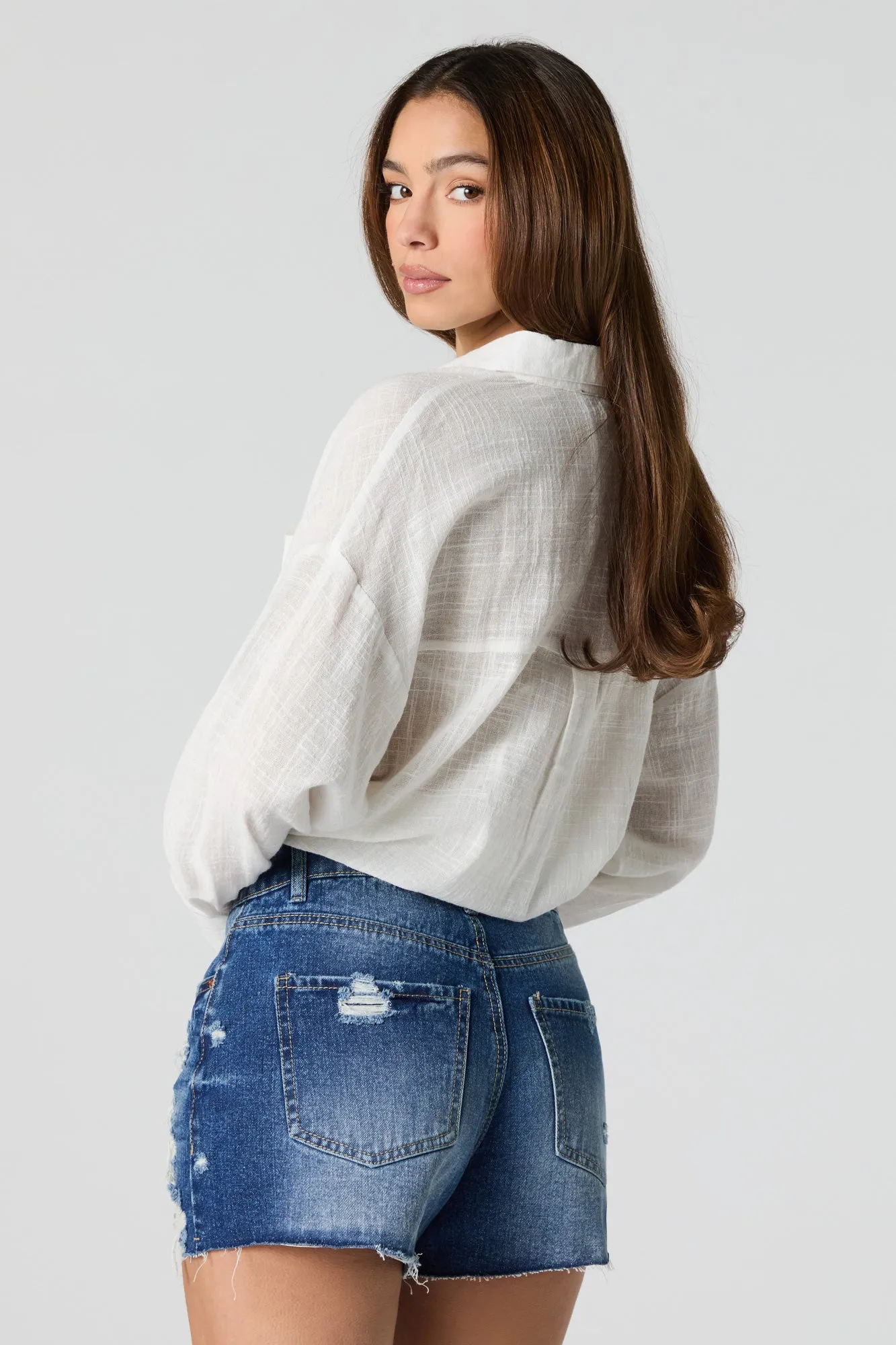 Short de coupe garçonne en denim d'aspect usé