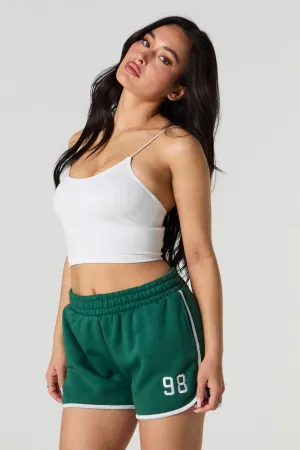 Short en molleton avec motif brodé et ourlet arrondi