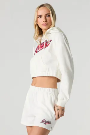 Short en molleton avec motif brodé