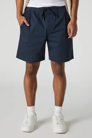 Short mi-long uni à taille coulissante