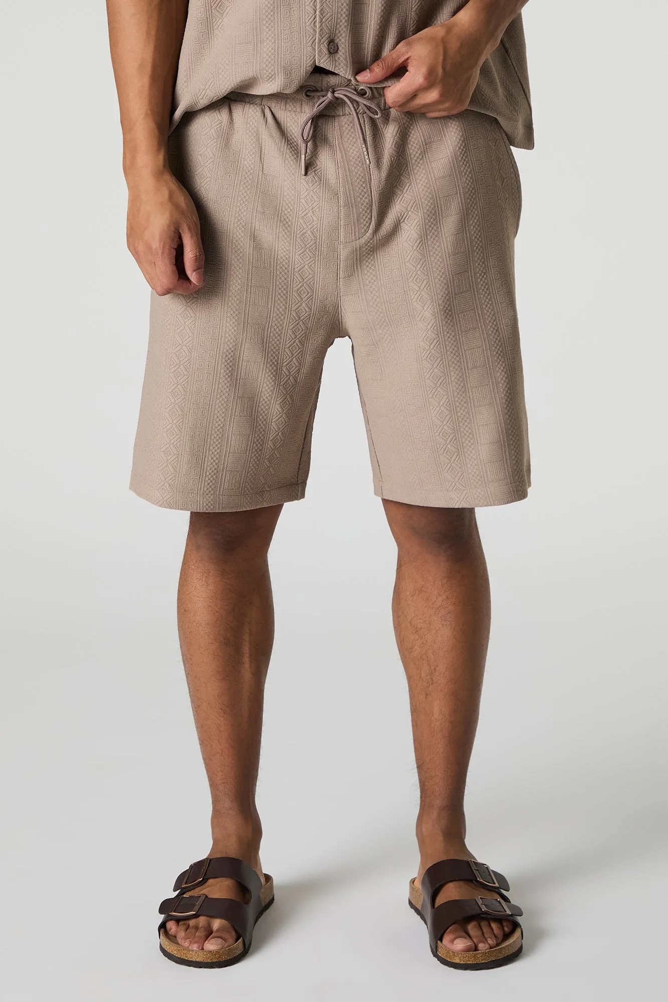 Short texturé à taille coulissante avec motif géométrique